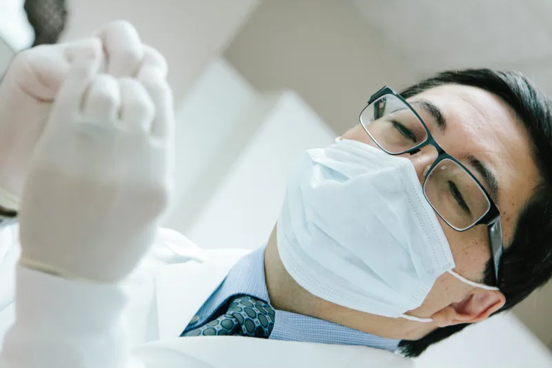 Hygienist working on a patient